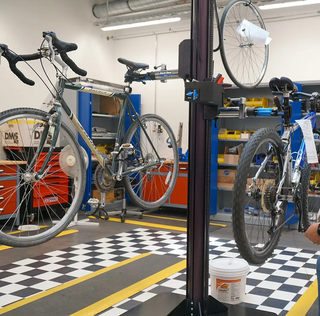Bicycles on repair stands in a workshop